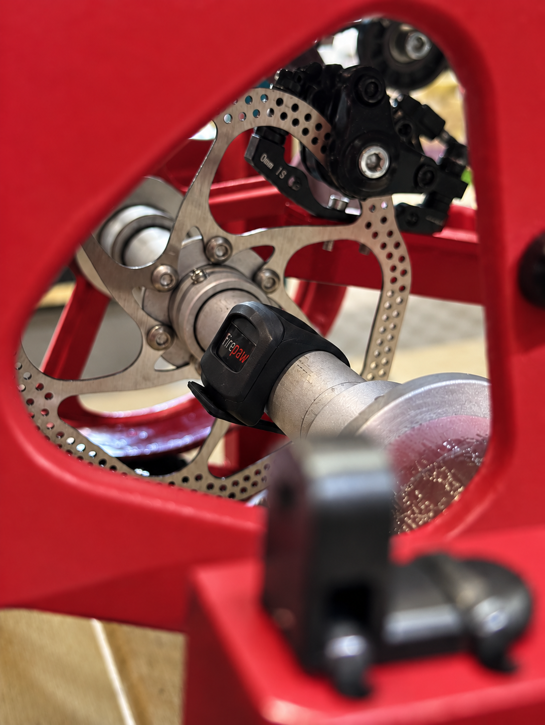 Red Mechanical Rotor Through Frame